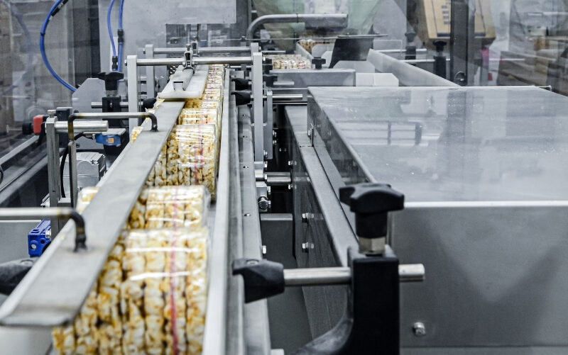 Animal feed manufacturer fined after worker trapped in unguarded conveyor